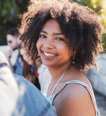 curly hair woman smiling