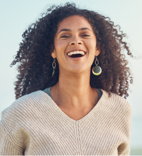 curly hair woman smiling