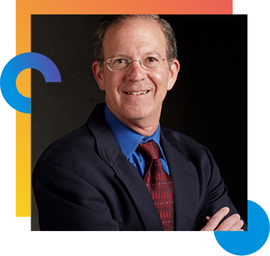 Dr. Jerry with a serious expression.